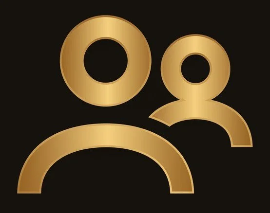 Gold icon of two stylized human figures on a black background.