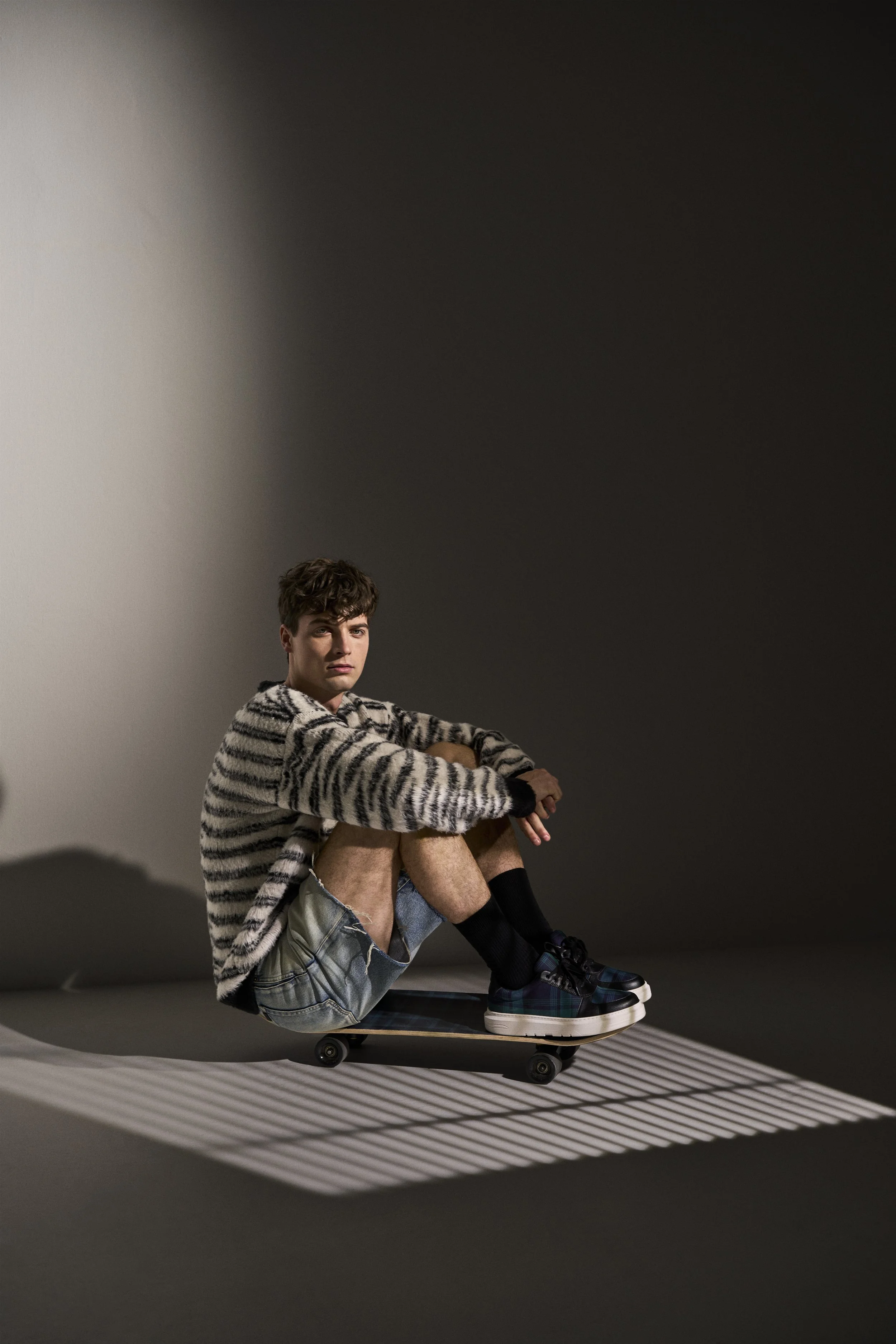 CHARLES-KEITH-fall-22-tartan-male-model-09.jpg