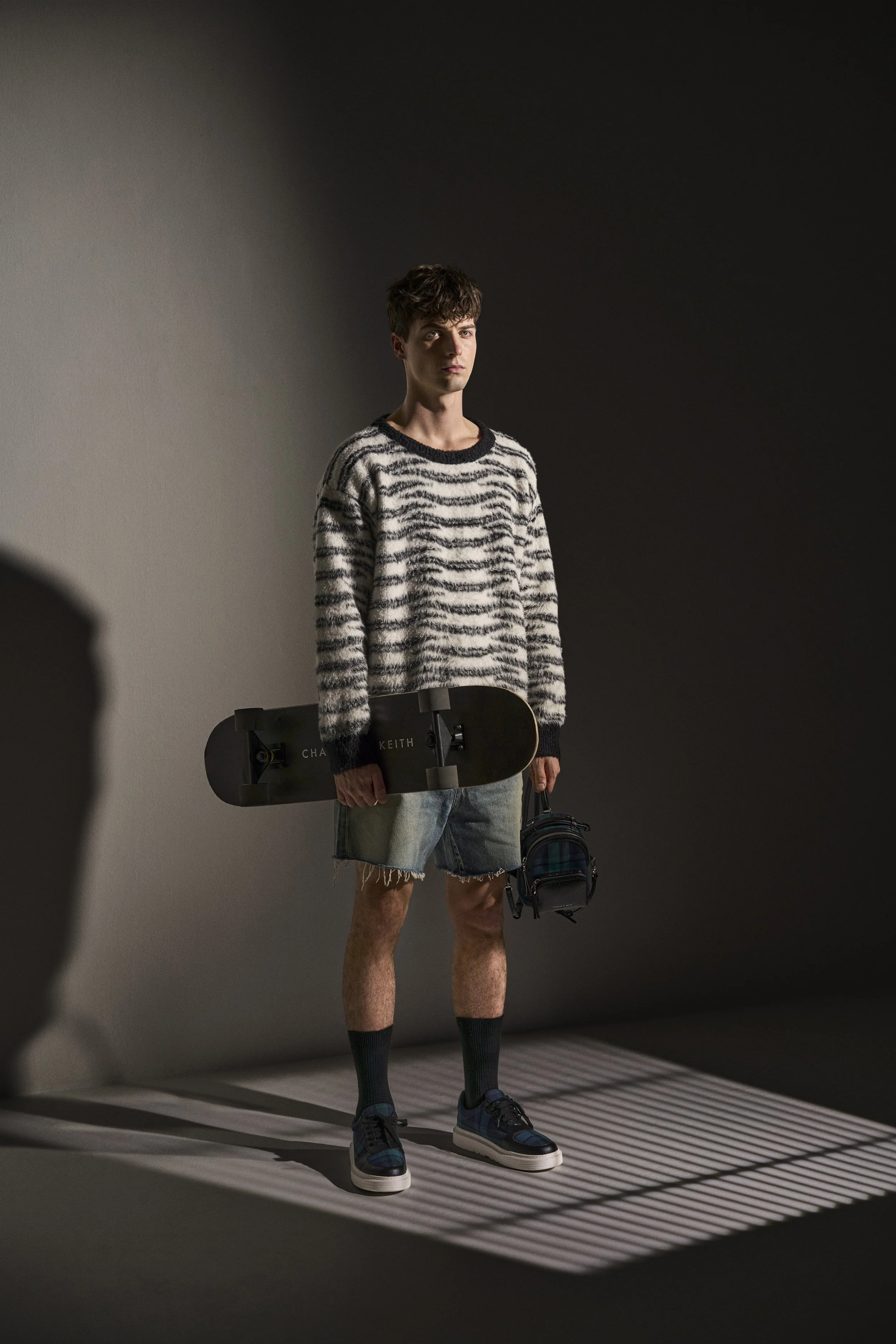 CHARLES-KEITH-fall-22-tartan-male-model-10.jpg