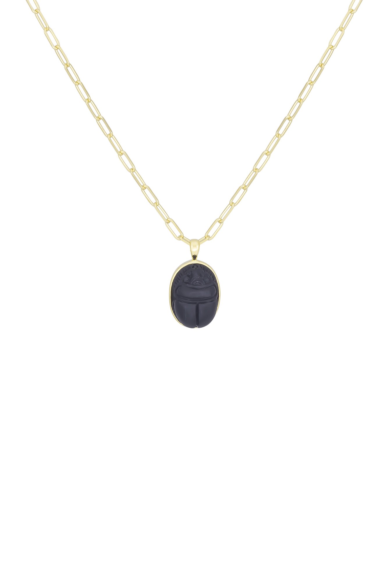 Gouden ketting met een zwart medaillon, waaronder een opengesperde lachende gezichtsmasker.