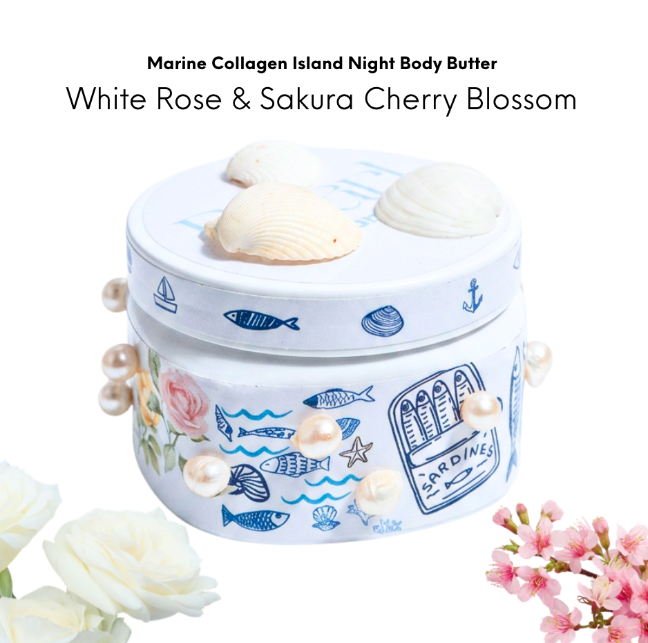 A round white container with a nautical design, decorated with pearls and seashells, labeled 'Marine Collagen Island Night Body Butter' in cherry blossom and fish patterns.