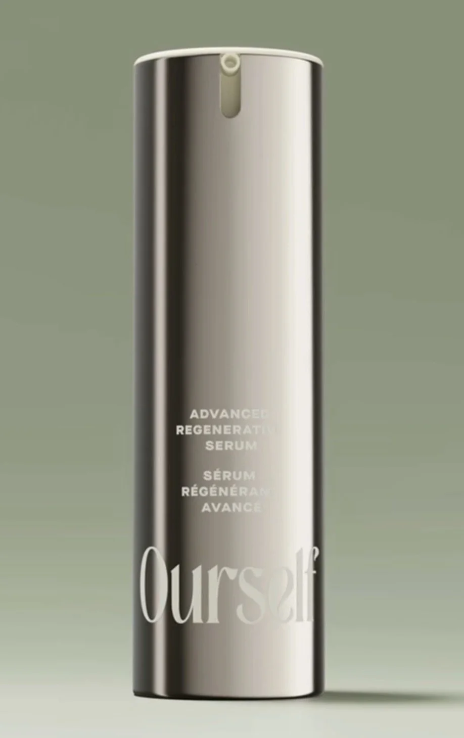 A tall, sleek silver bottle of Ourself Advanced Regenerative Serum with a minimalist label and a cream-colored top, standing against a muted green background.
