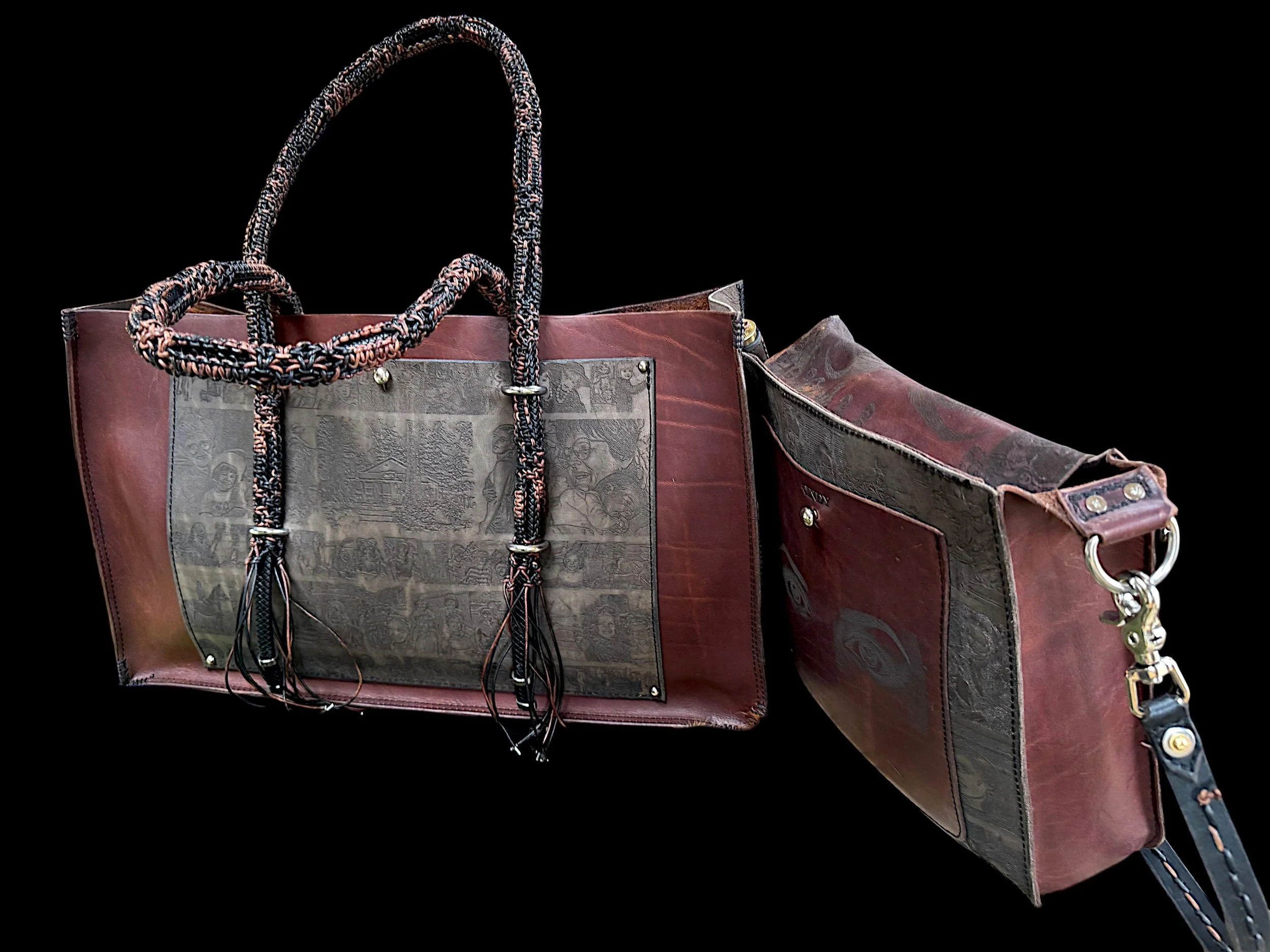 Close-up of a reddish-brown designer handbag with black and pink braided handles and detailed engravings on the front, set against a black background.