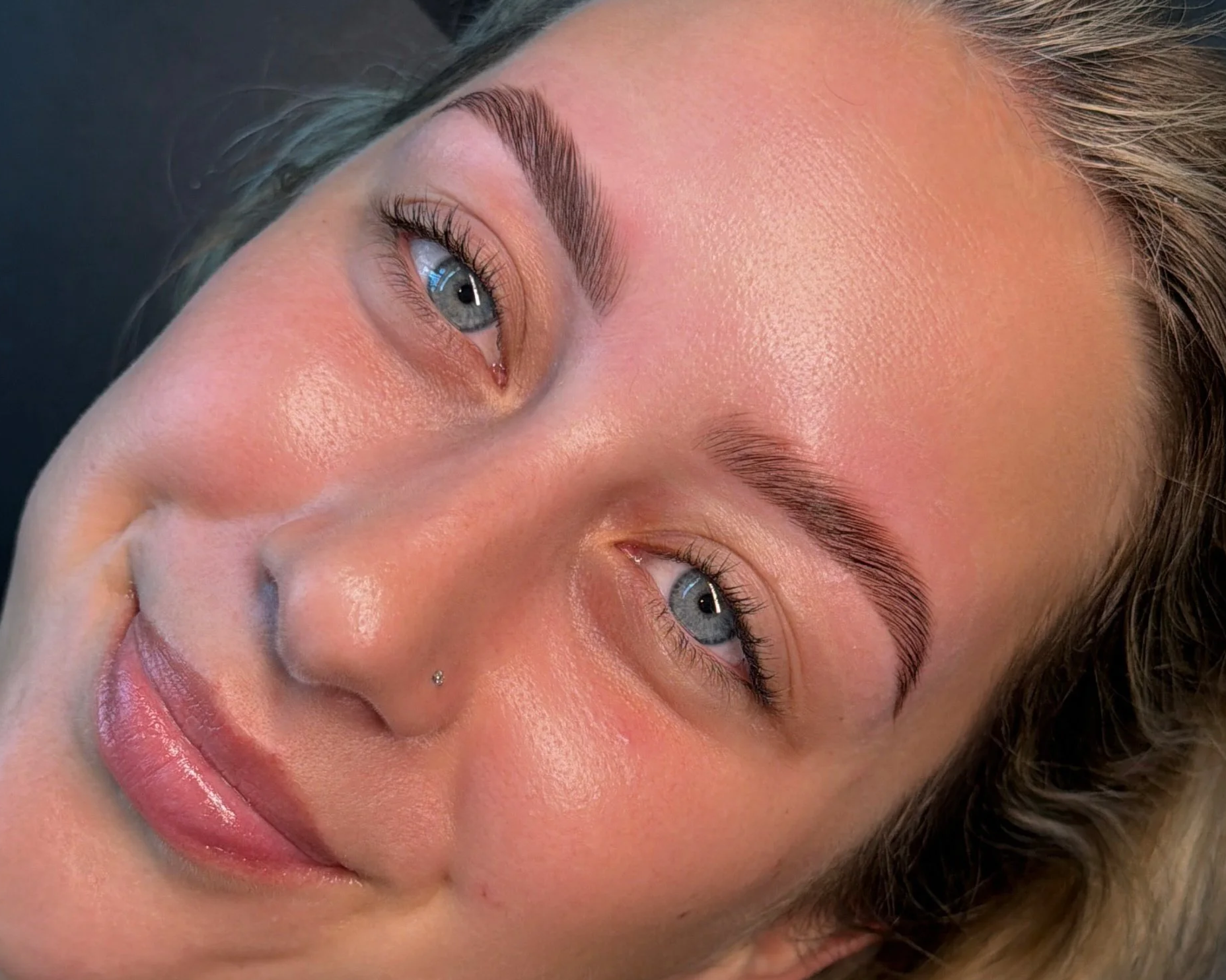 brow lamination with fuller, shaped brows at Tandem Lash Society in St. Petersburg, FL.