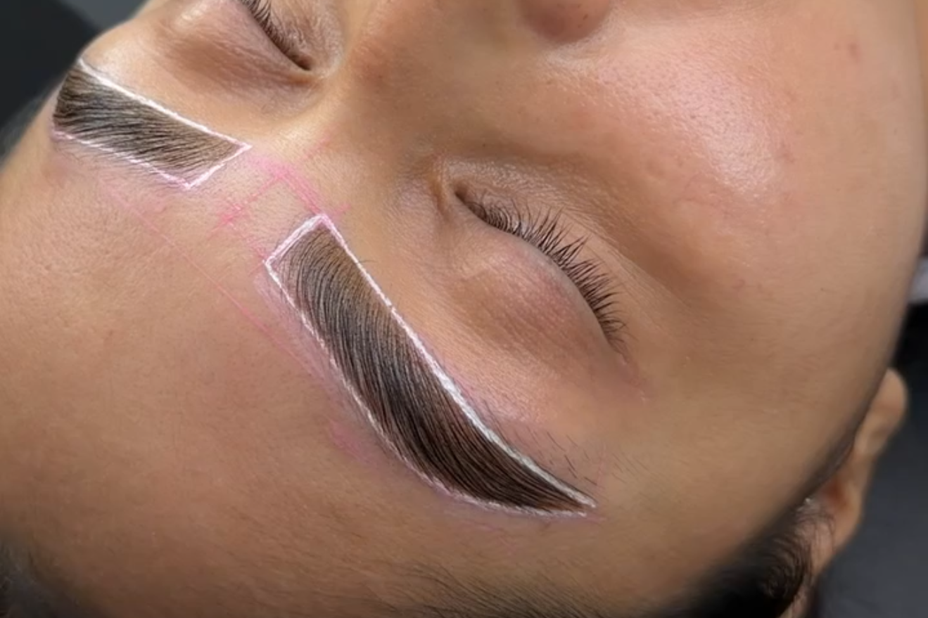 Brow wax and tint with custom brow mapping and shaping at Tandem Lash Society in St. Petersburg, FL.