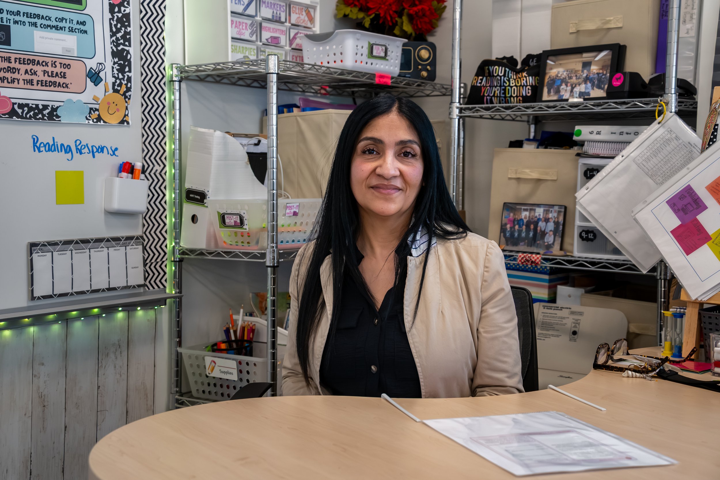 Boston History/Humanities teacher Tara Correa sits for a posed photograph in her classroom.