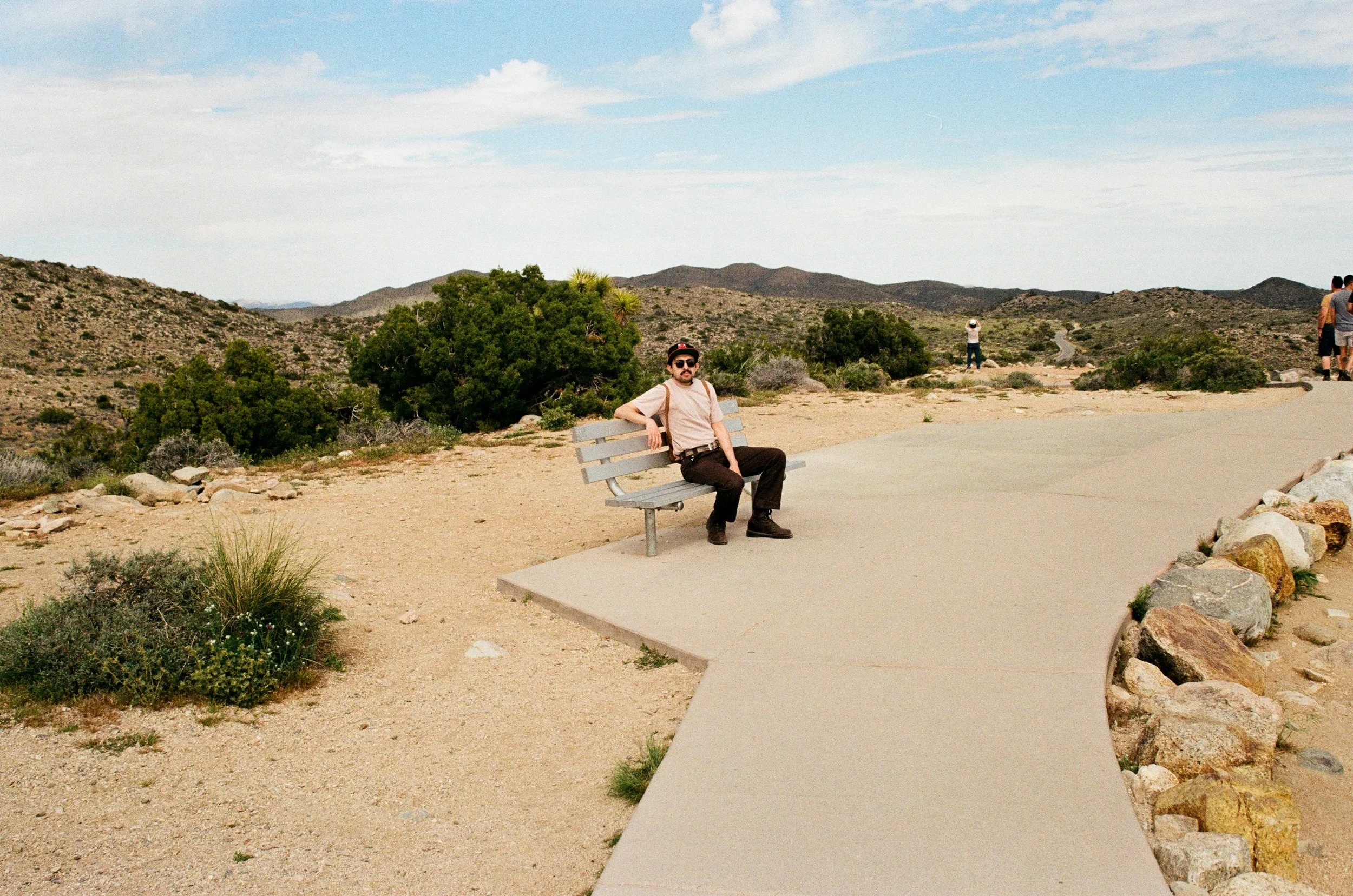 Boston Massachusetts, Texas-born, Mexican-American photographer and videographer Ramon Galvan sits for a self-portrait photo at Joshua Tree National Park.