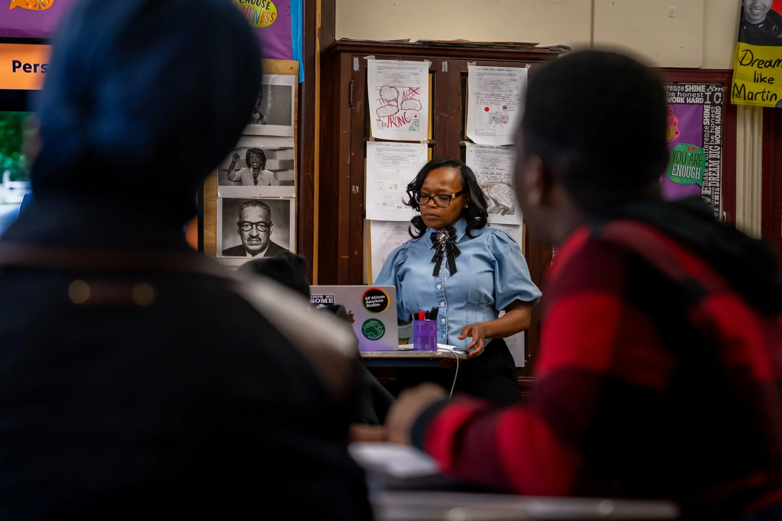 Boston Public Schools educator Tanisha Milton reads from her laptop in her AP African American Studies classroom at TechBoston Academy in Dorchester, Massachusetts.