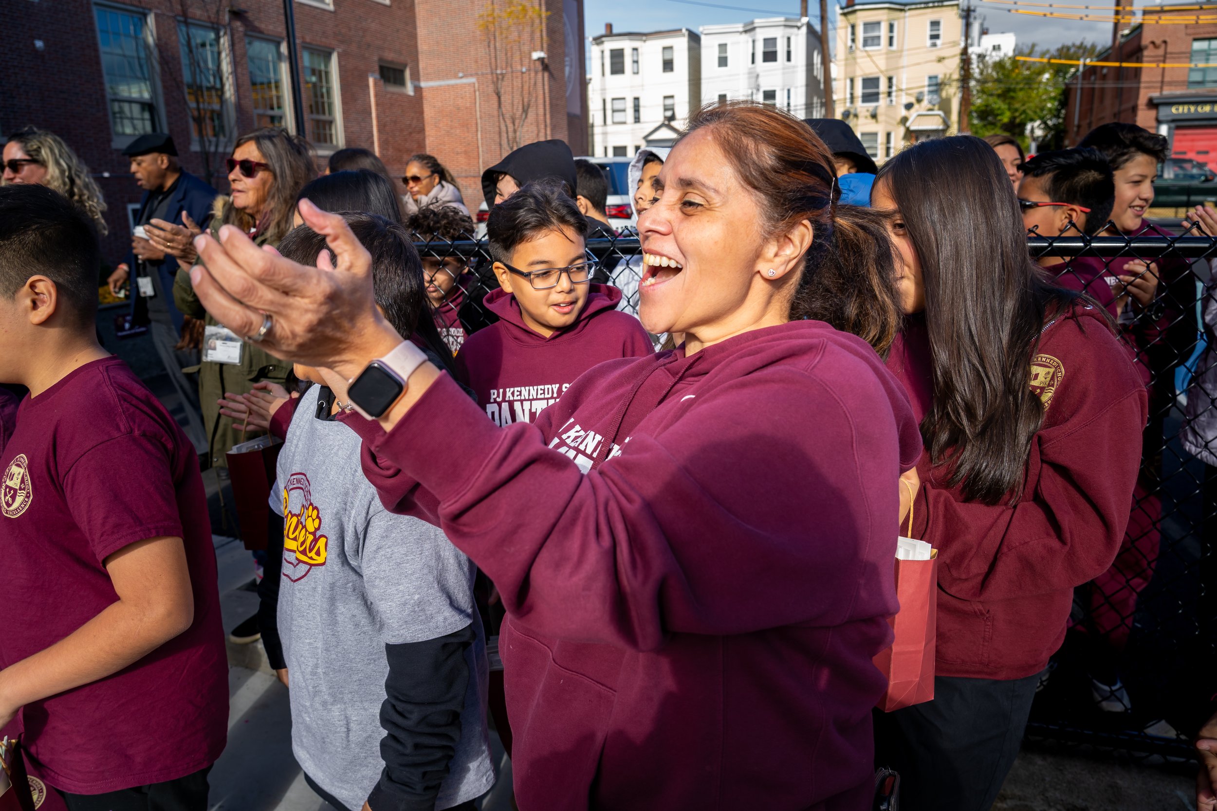 Patrick J Kennedy Elementary School educator claps and cheers.