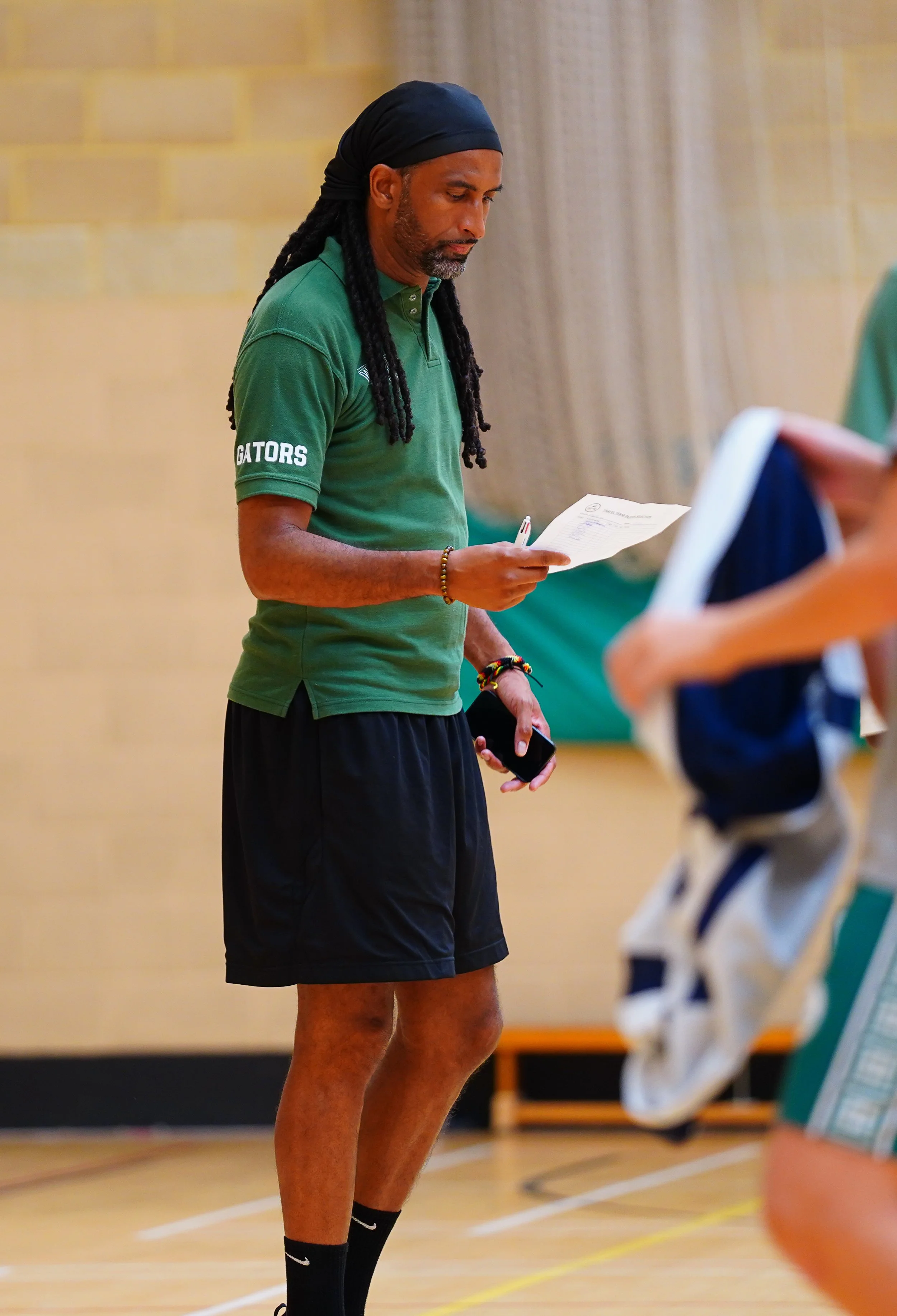 Gators basketball academy director