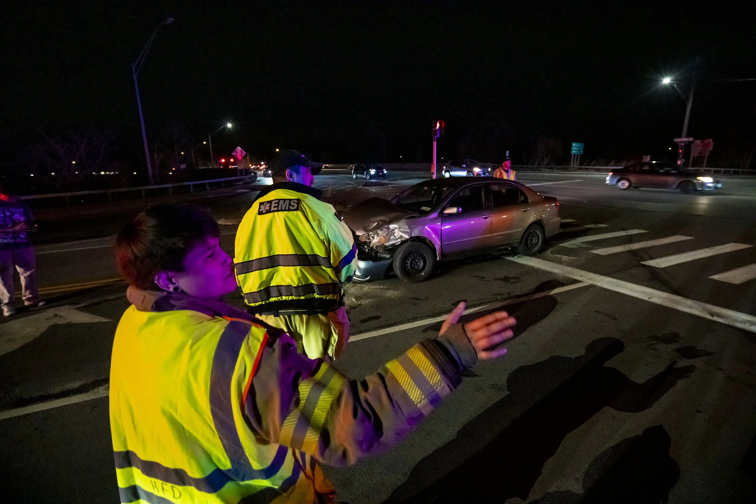 Members of the Henrietta Fire Department respond to a car crash in Henrietta, New York on April 5, 2026