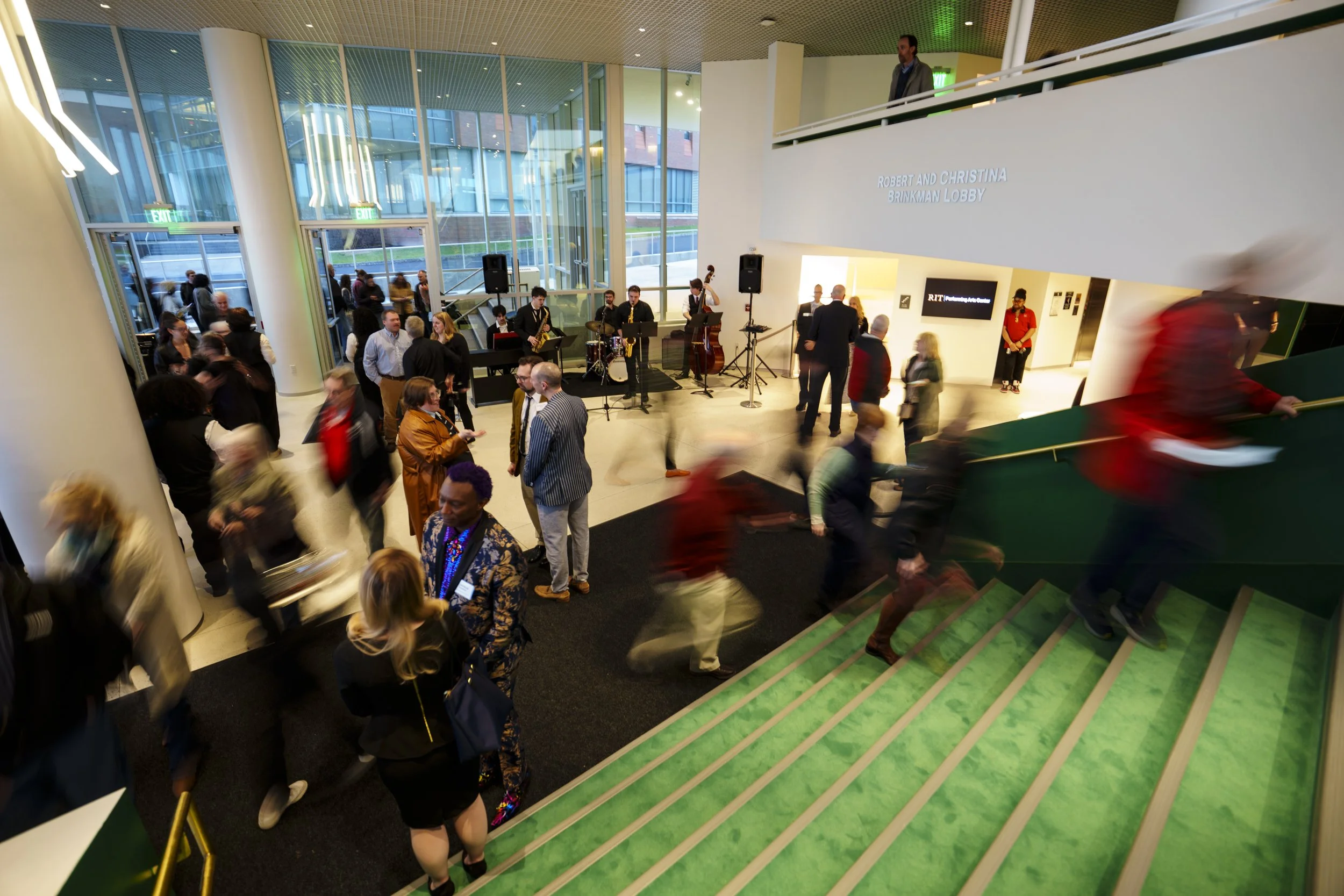 Visitors move through the lobby at the grand opening of the RIT Performing Arts Center on April 10, 2026