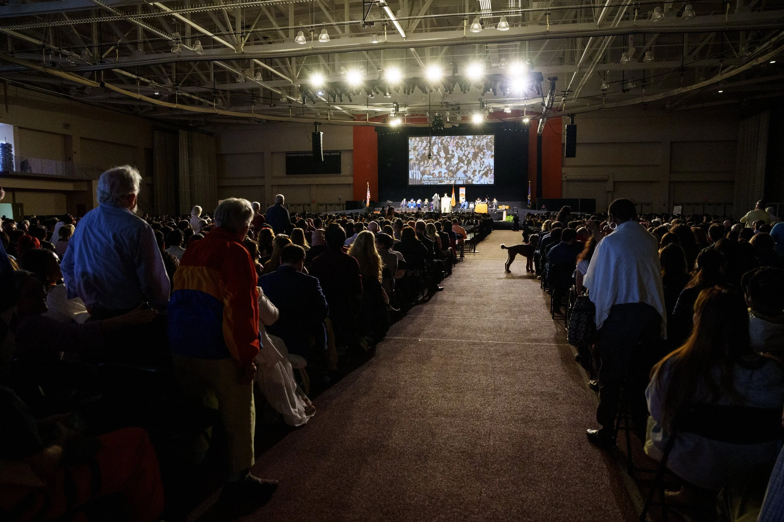 Grandparents stand to be recognized at the Gleason College of Information Science at the Rochester Institute of Technology commencement May 9, 2026