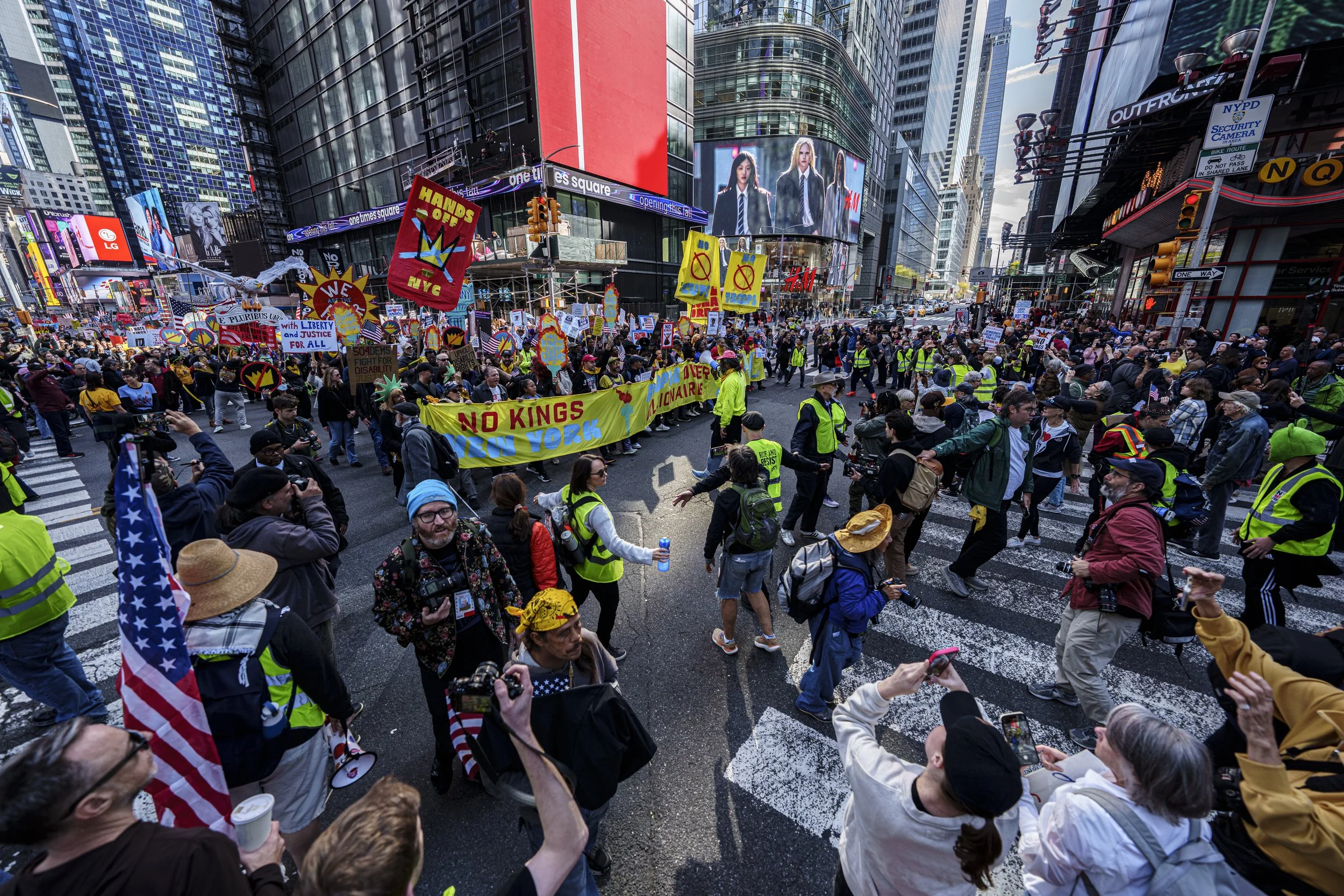 Hundreds of thousands of demonstrators gather for the “No Kings” protest on Seventh Avenue, south of Times Square, in New York City, on Oct. 18, 2025.
