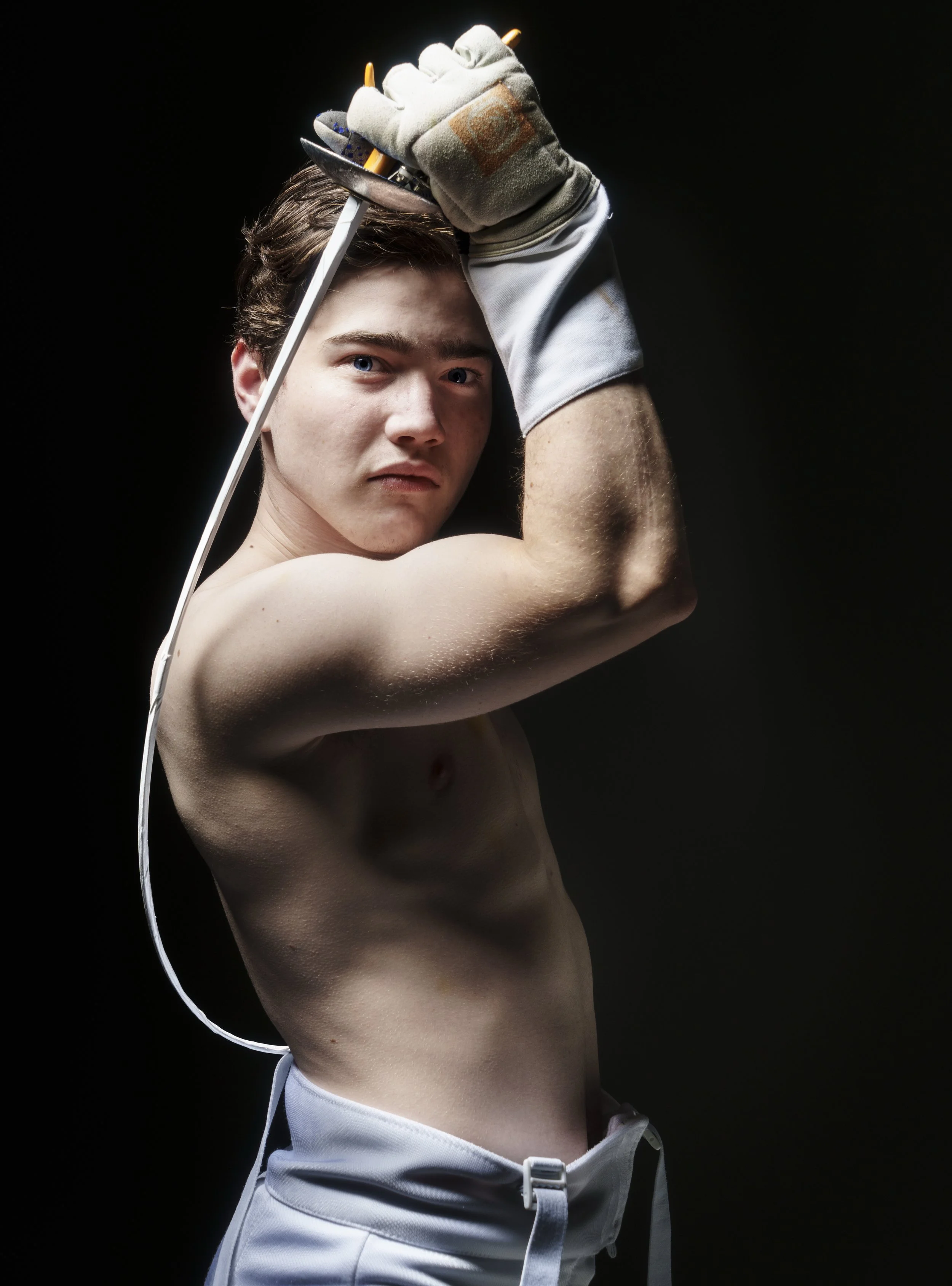 Carlos Sanchez poses at the conclusion of a photo shoot involving fencers on Nov. 23, 2026.
