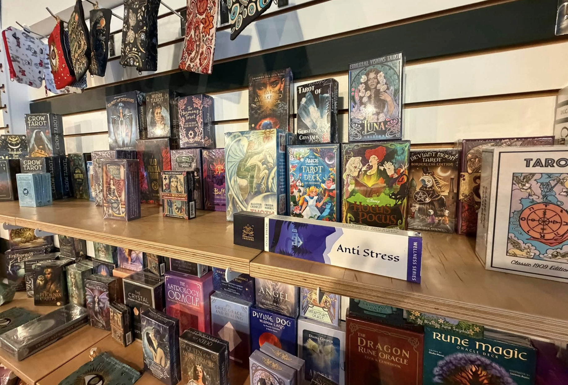 shelves filled with tarot and oracle cards