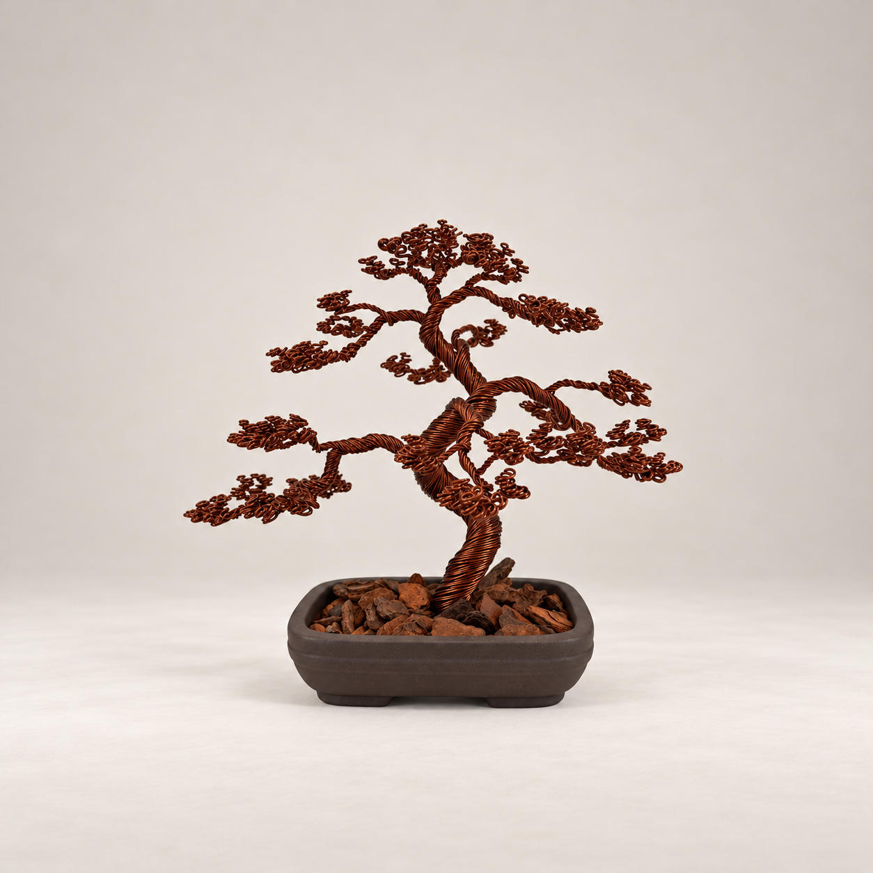 Copper Wire Bonsai in Minimalist Studio.png