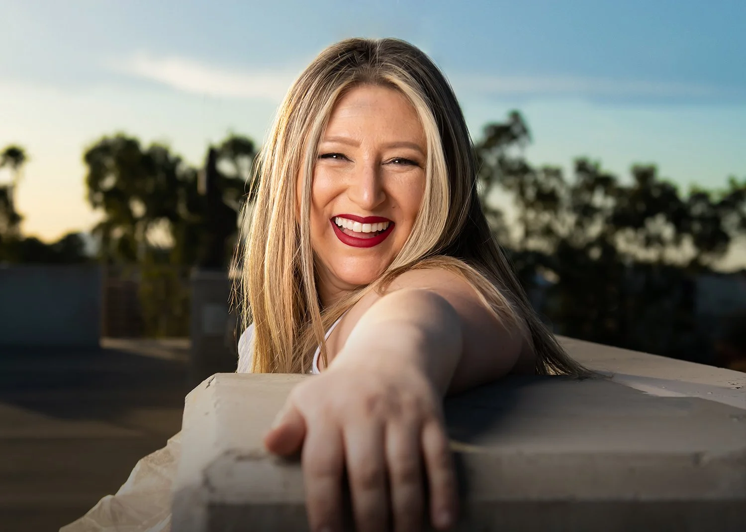 young woman laughing during a tucson branding photoshoot