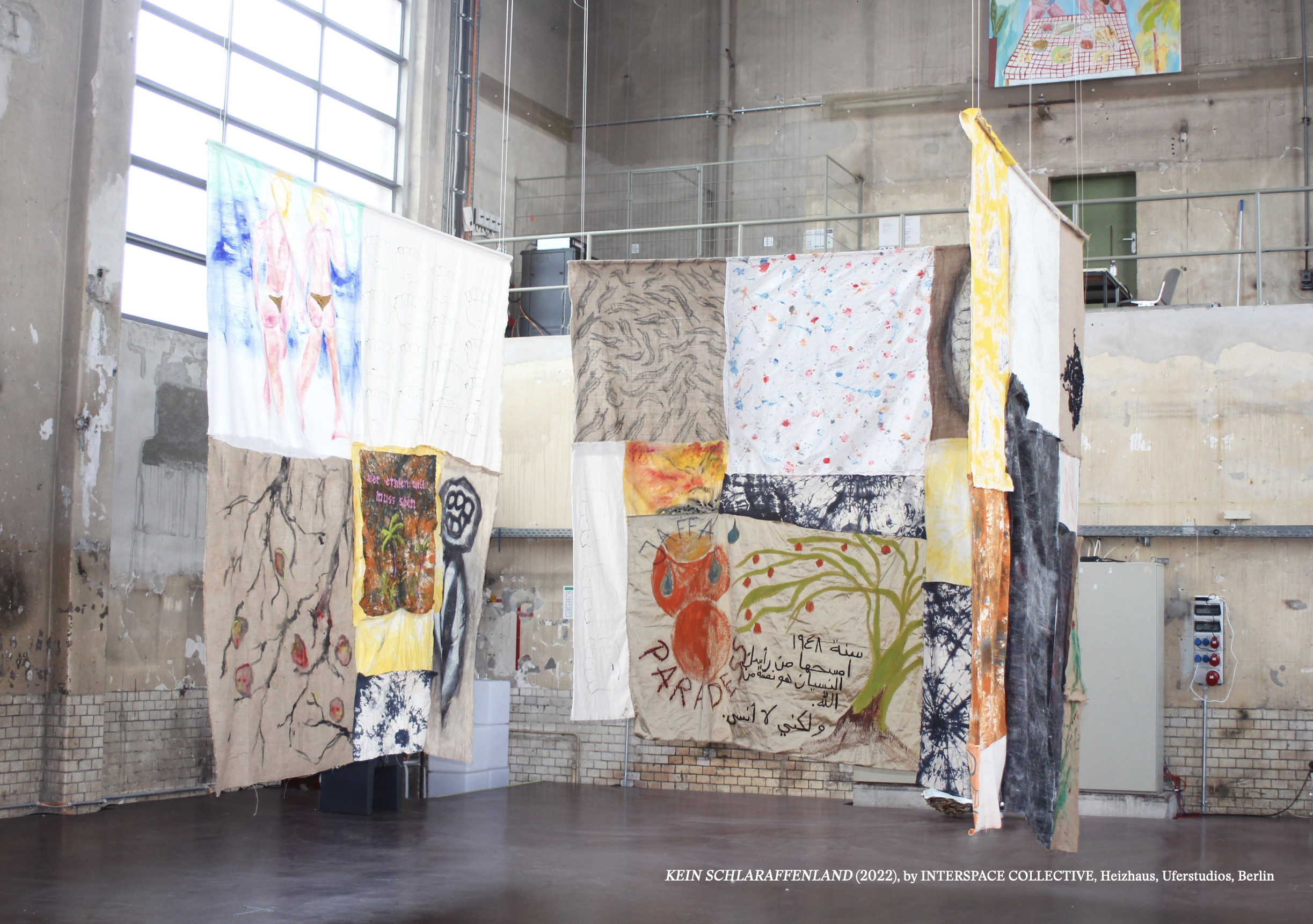 "kein schlaraffenland", collective work by Interspace Collective, Uferhallen, 2022