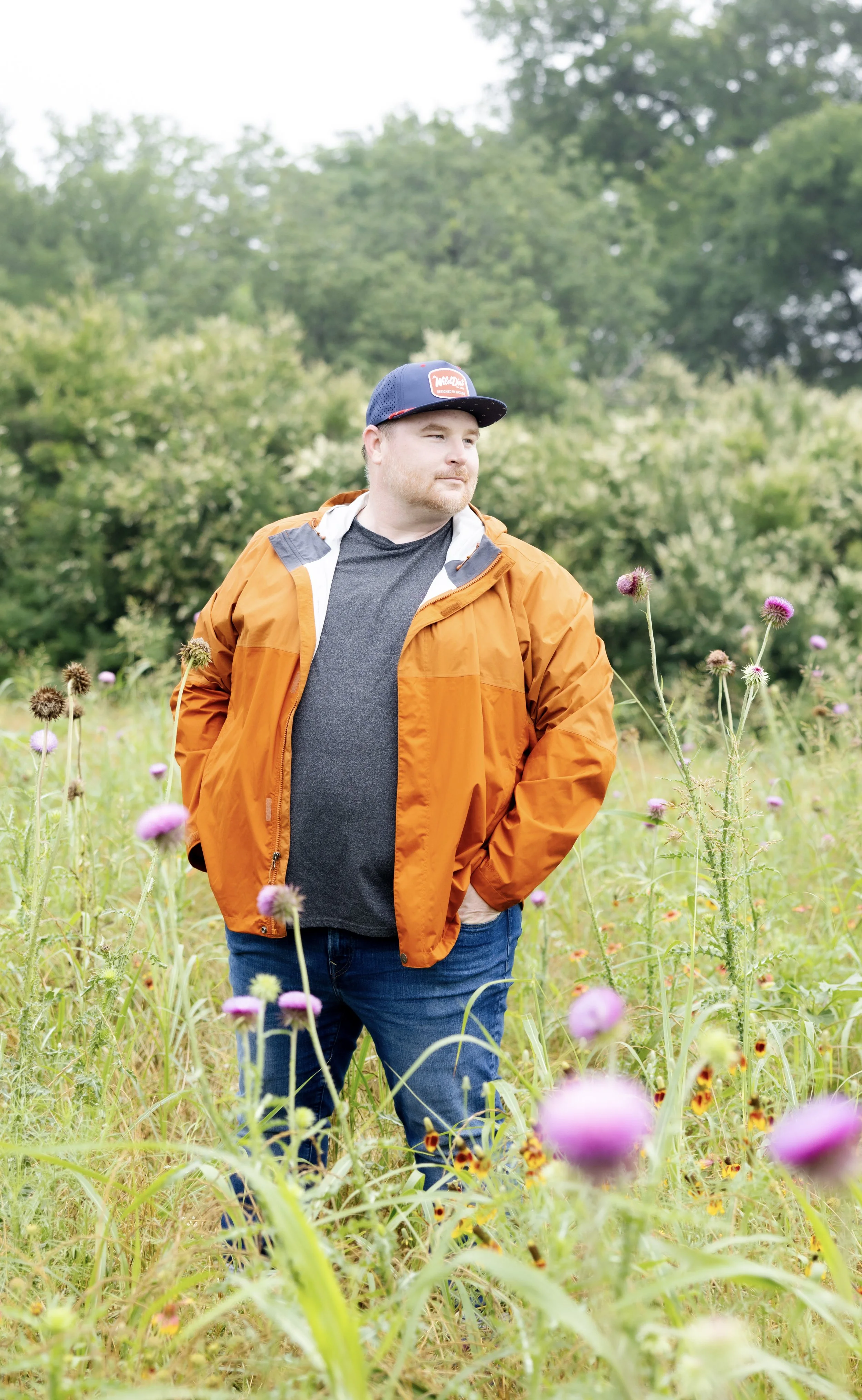 Alexander Kwapis standing in the wild