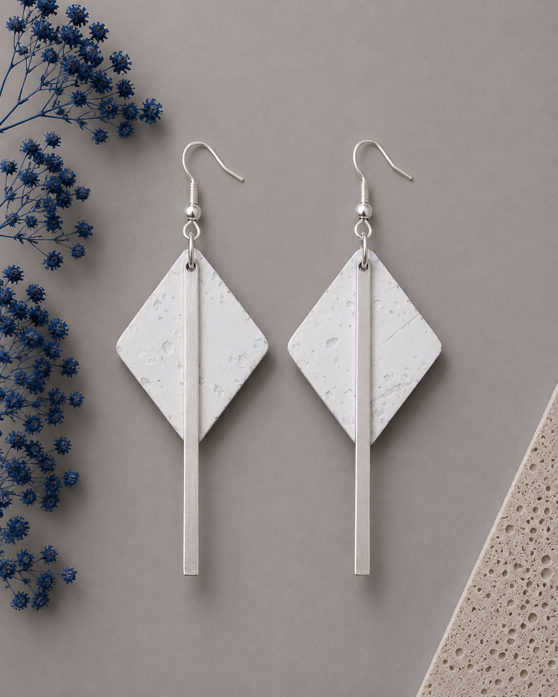 Diamond-shaped white cork fabric earrings with sleek silver-color bar