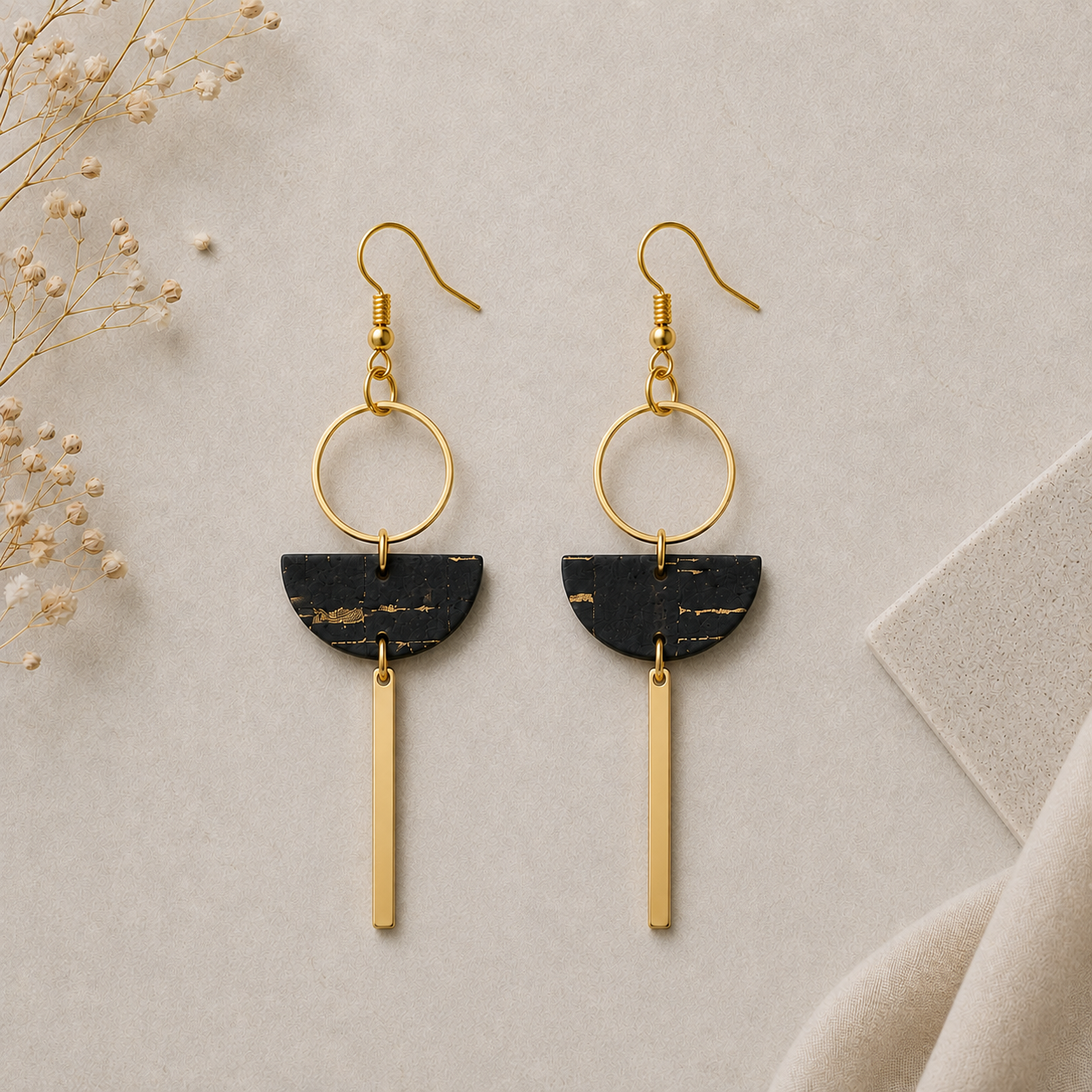 Geometric black cork fabric earrings with gold color hoop and bar