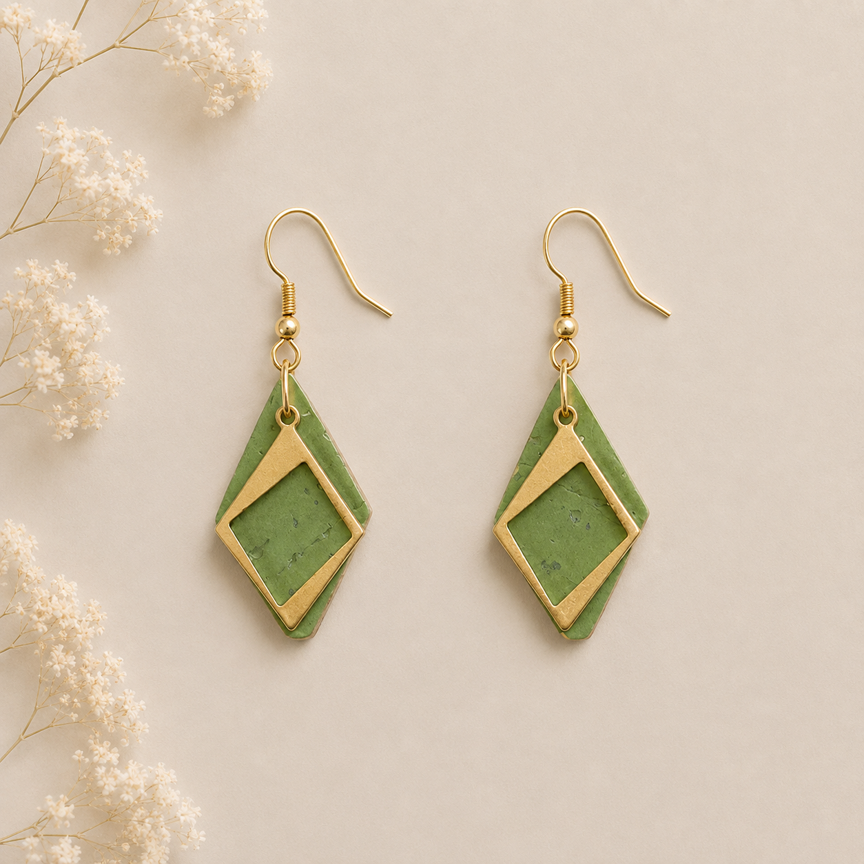Green cork fabric earrings with layered gold diamond-shaped frames