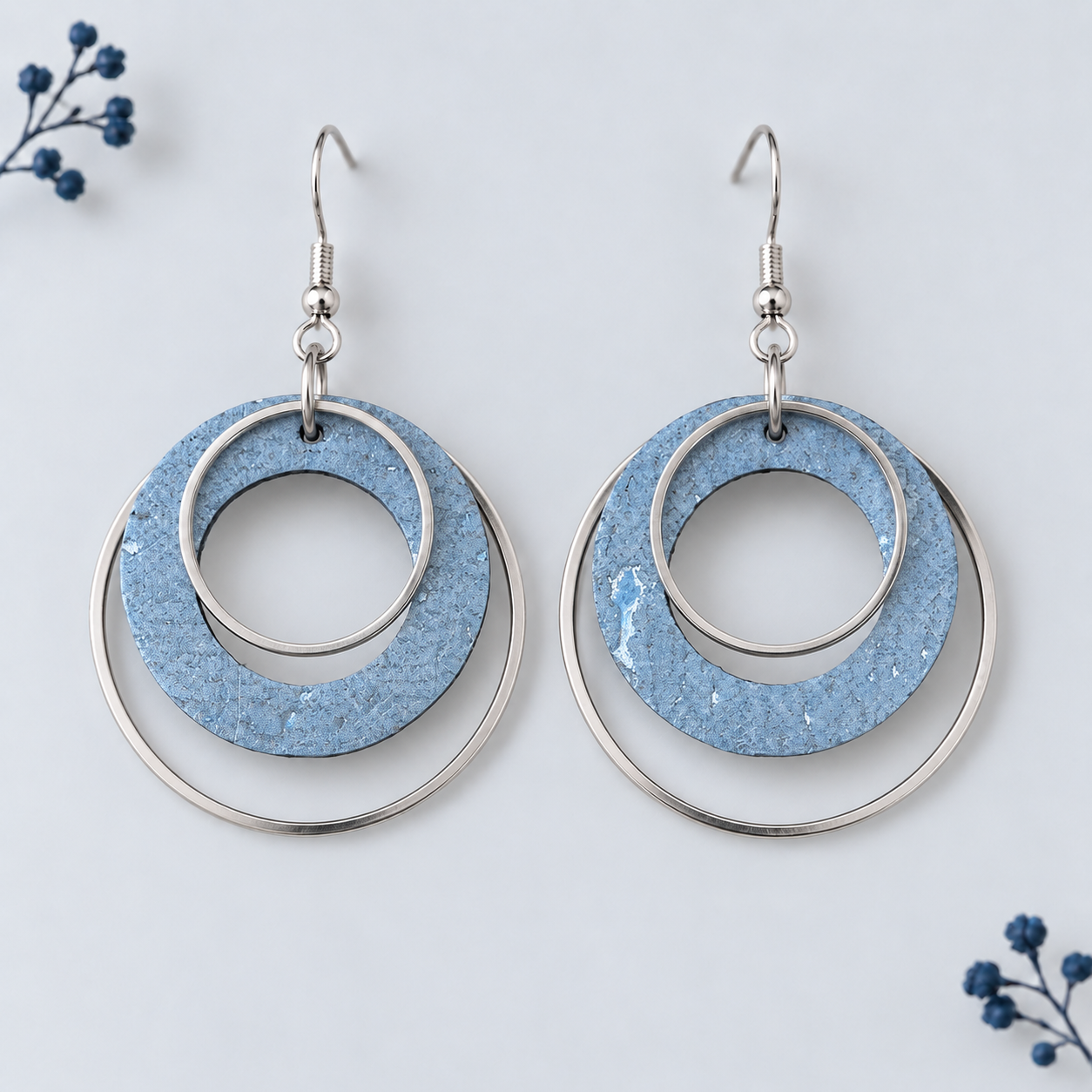 metallic blue colored cork fabric with layered silver color hoops