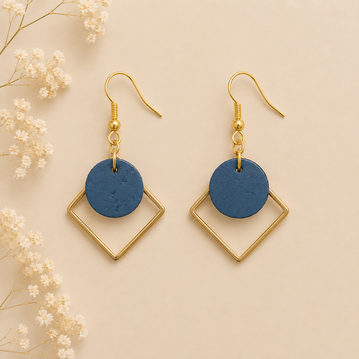 Round teal color cork fabric earrings with gold color diamond-shaped frames