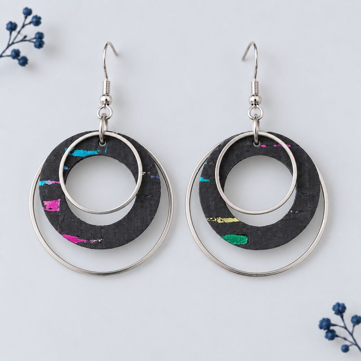 rainbow colored cork fabric with layered silver color hoops