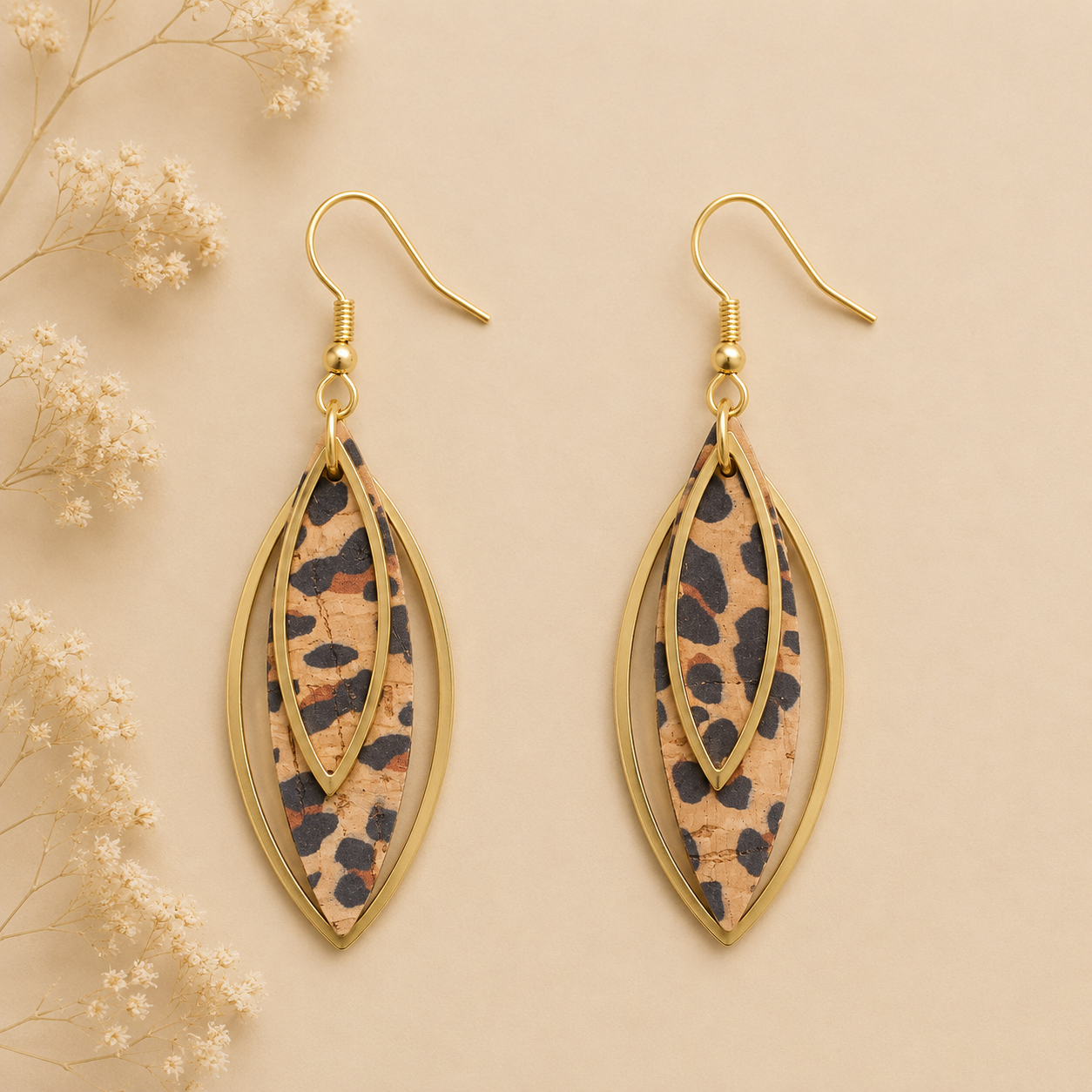 Leaf-shaped cheetah cork fabric earrings with gold color layered frames