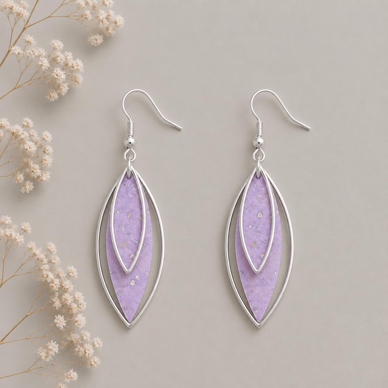 Leaf-shaped rose gold cork fabric earrings with silver color layered frames
