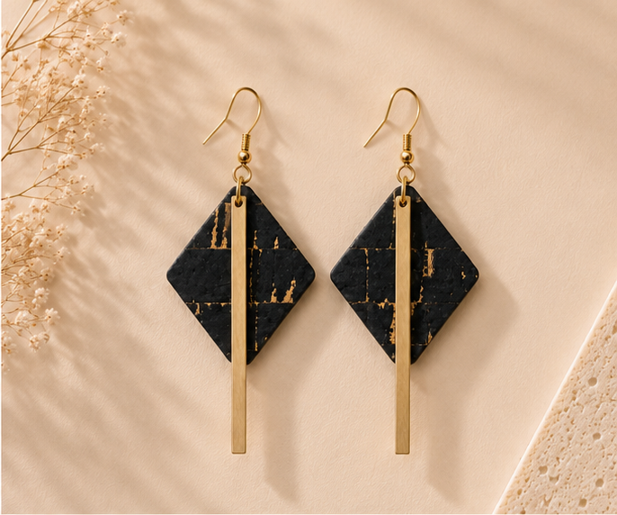 Diamond-shaped black cork fabric earrings with sleek gold-color bar