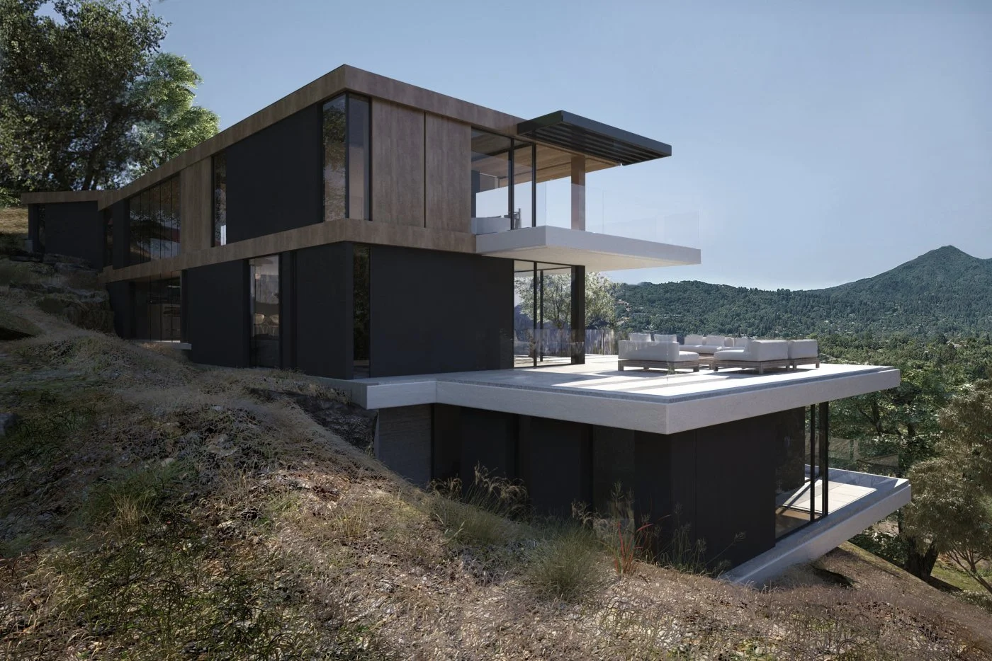 Modern multi-level house on a hillside with large outdoor decks, glass walls, facing Mt. Tamalpais, on the Kentfield ridge. Marin County, California