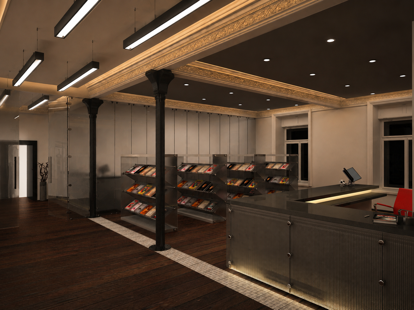Interior of a modern office or commercial space with a reception desk, metal shelving with magazines or brochures, dark ceiling with recessed and hanging lights, and decorative columns, featuring dark wood flooring and large windows.