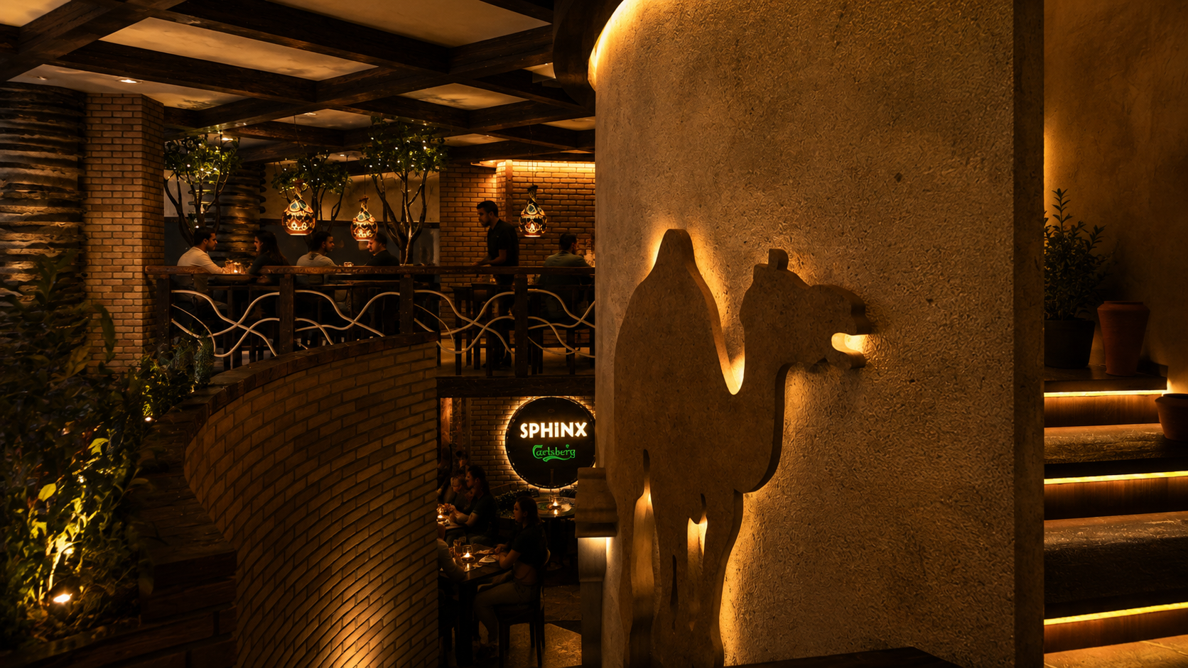 Dimly lit restaurant interior with brick and stucco walls, decorative hanging lamps, and a silhouette of a camel sculpture on the wall. Restaurant, Sphinks