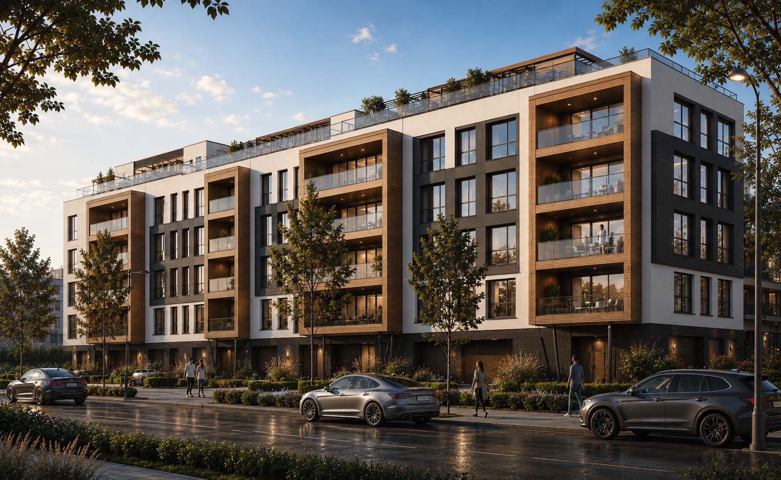 Modern multi-story apartment building with balconies, trees, parked cars, and people walking on the sidewalk at sunset. Konstantynowska, Ogród Botaniczny Łódź