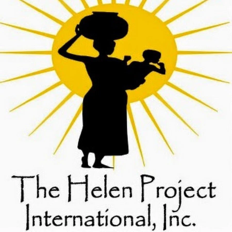 Silhouette of a woman carrying a bowl on her head and a small child in her arms, set against a yellow sunburst background. Text reads: The Helen Project International, Inc.