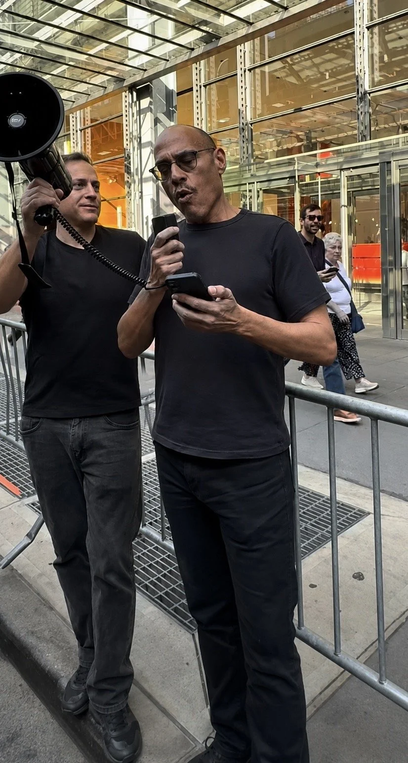 David Christopher Kaufman protesting against Nicholas Kristof at the headquarters of The New York Times.