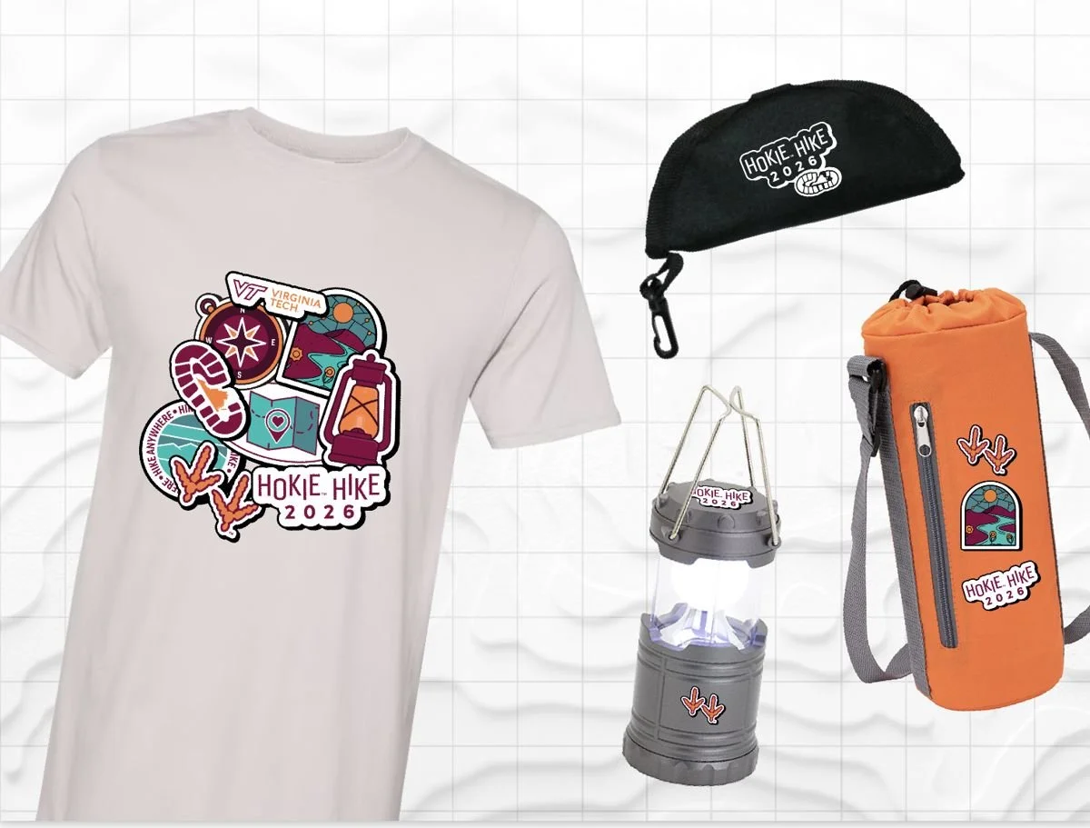 2026 Hokie Hike merchandise carrying the event identity: a T-shirt with sticker-style trail artwork, a hat, a lantern and a water bottle sling.