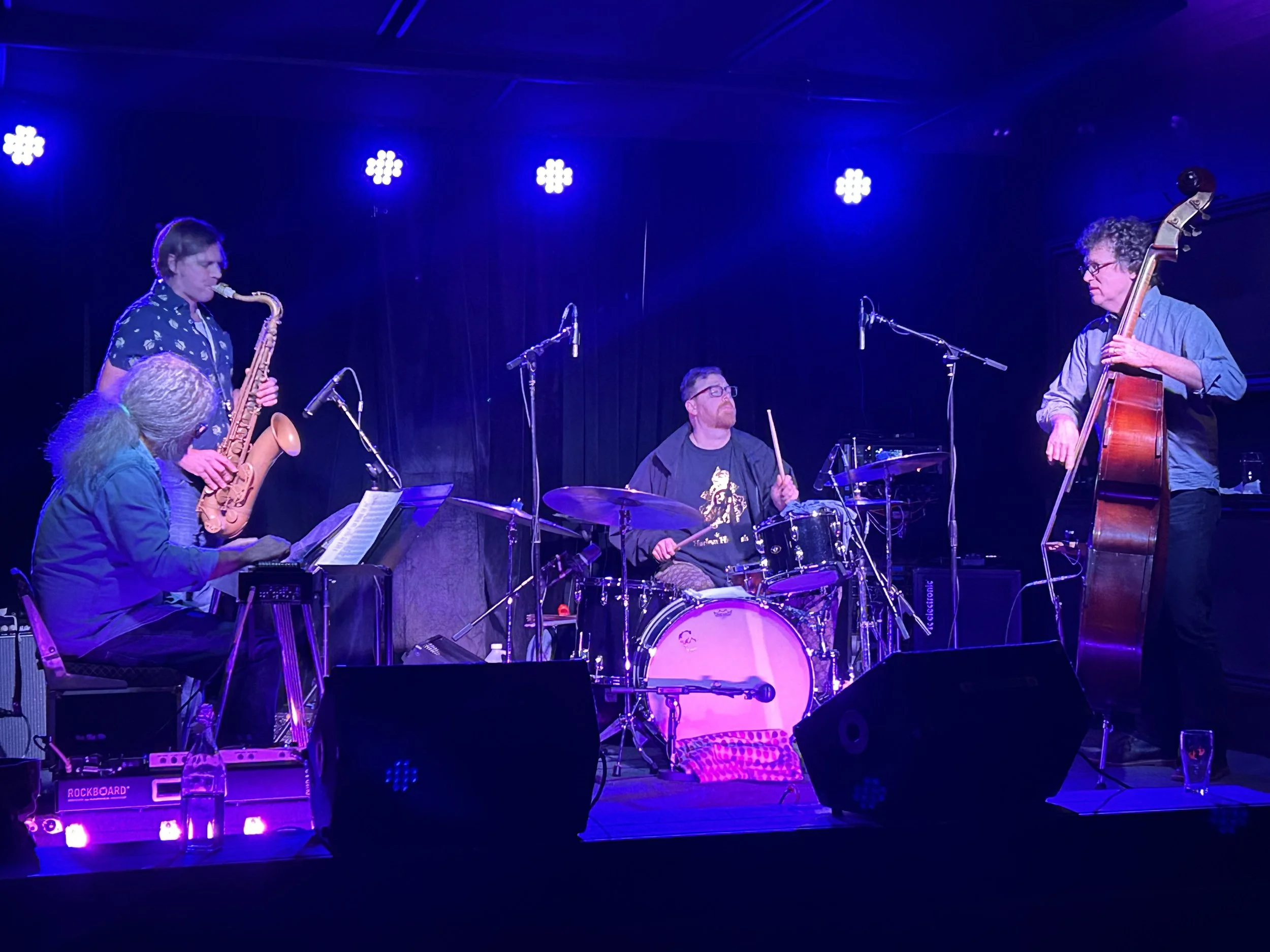 Daniel Hall performing drums on stage with his band Danger Hall