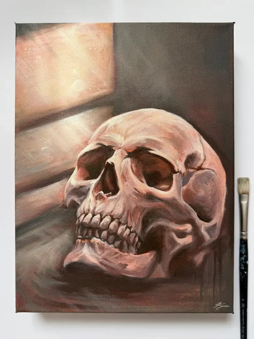 A painting of a human skull resting on a swirling dark surface, with a blurred background suggesting a wooden or textured wall.