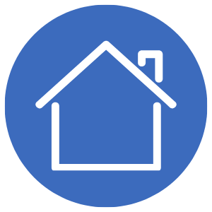 A blue circle sign with a white outline of a house and an arrow pointing to the top right.