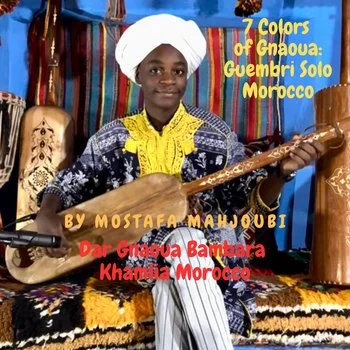 A teen male in traditional Moroccan clothing holding a stringed musical instrument, sitting in front of colorful woven textiles, with text highlighting Gnawa music in Morocco.