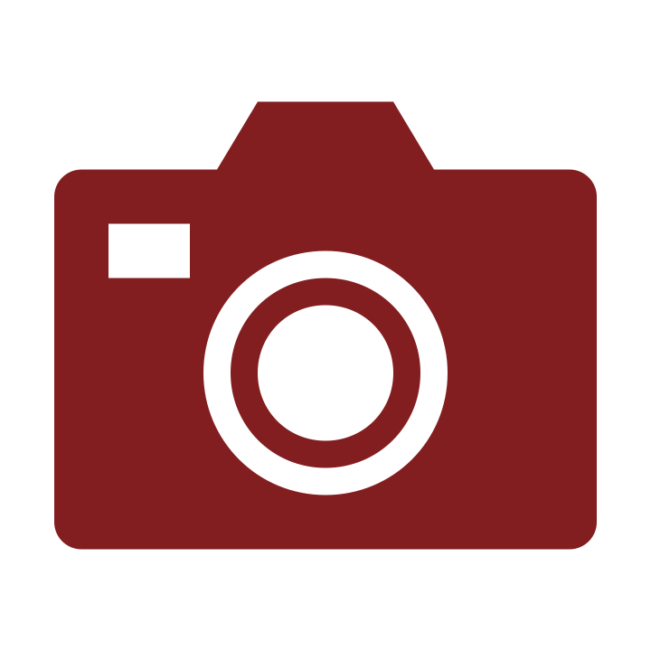 Icon of a red camera with a large lens and a small viewfinder on the top left.