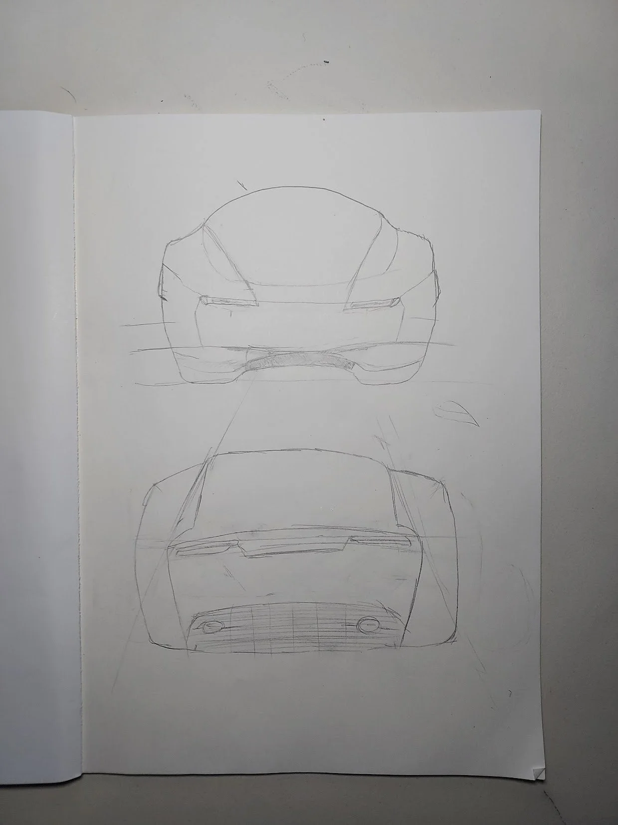 Sketch of a car from the front, showing the hood, headlights, and grille, with guidelines for detailing.