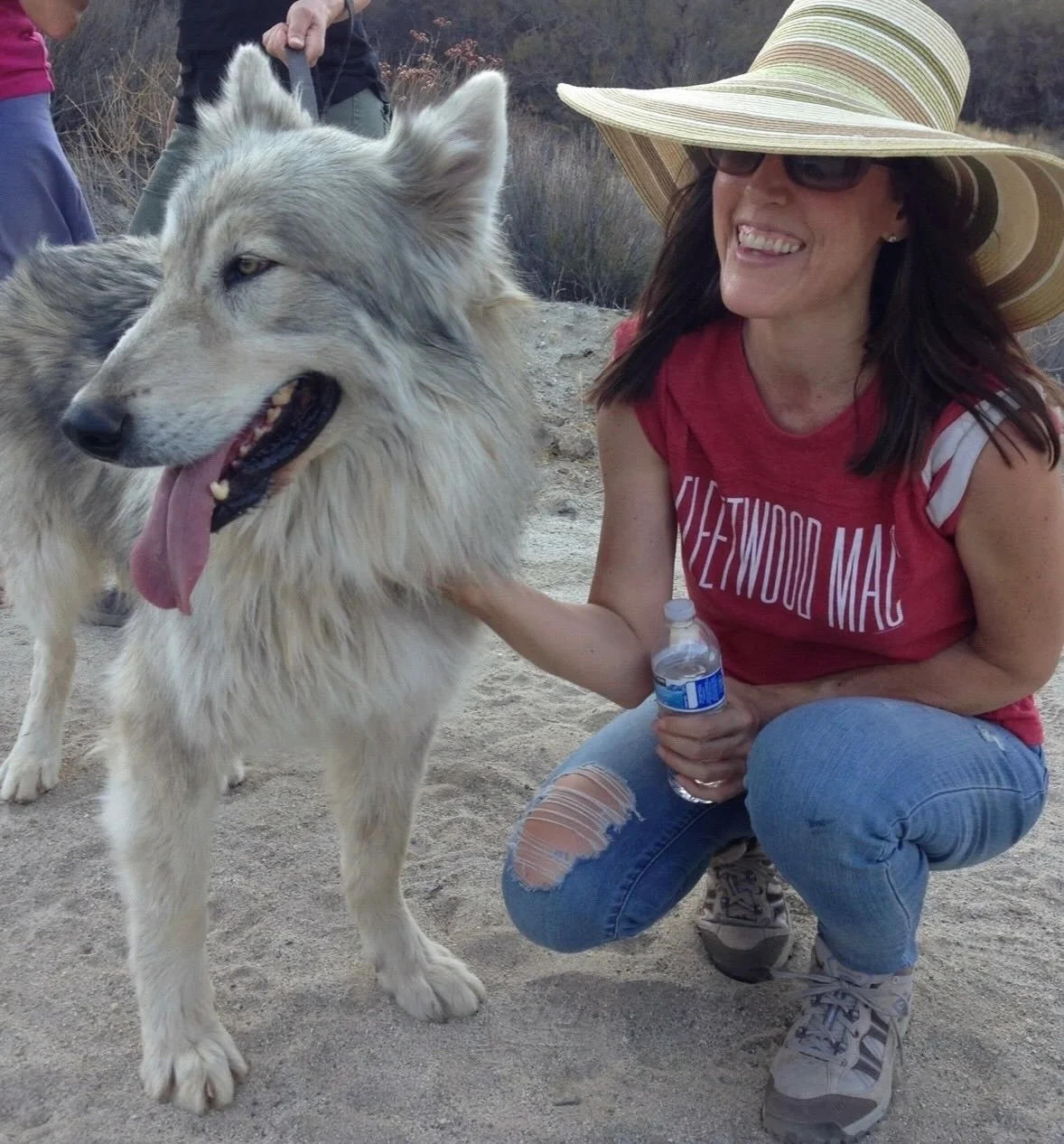 Audrey spending time with a wolf.