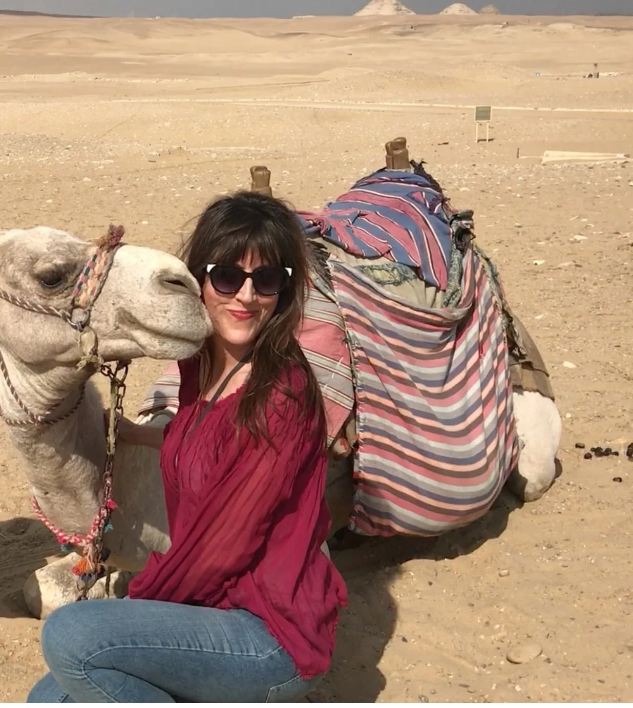 Audrey spending time with a camel.