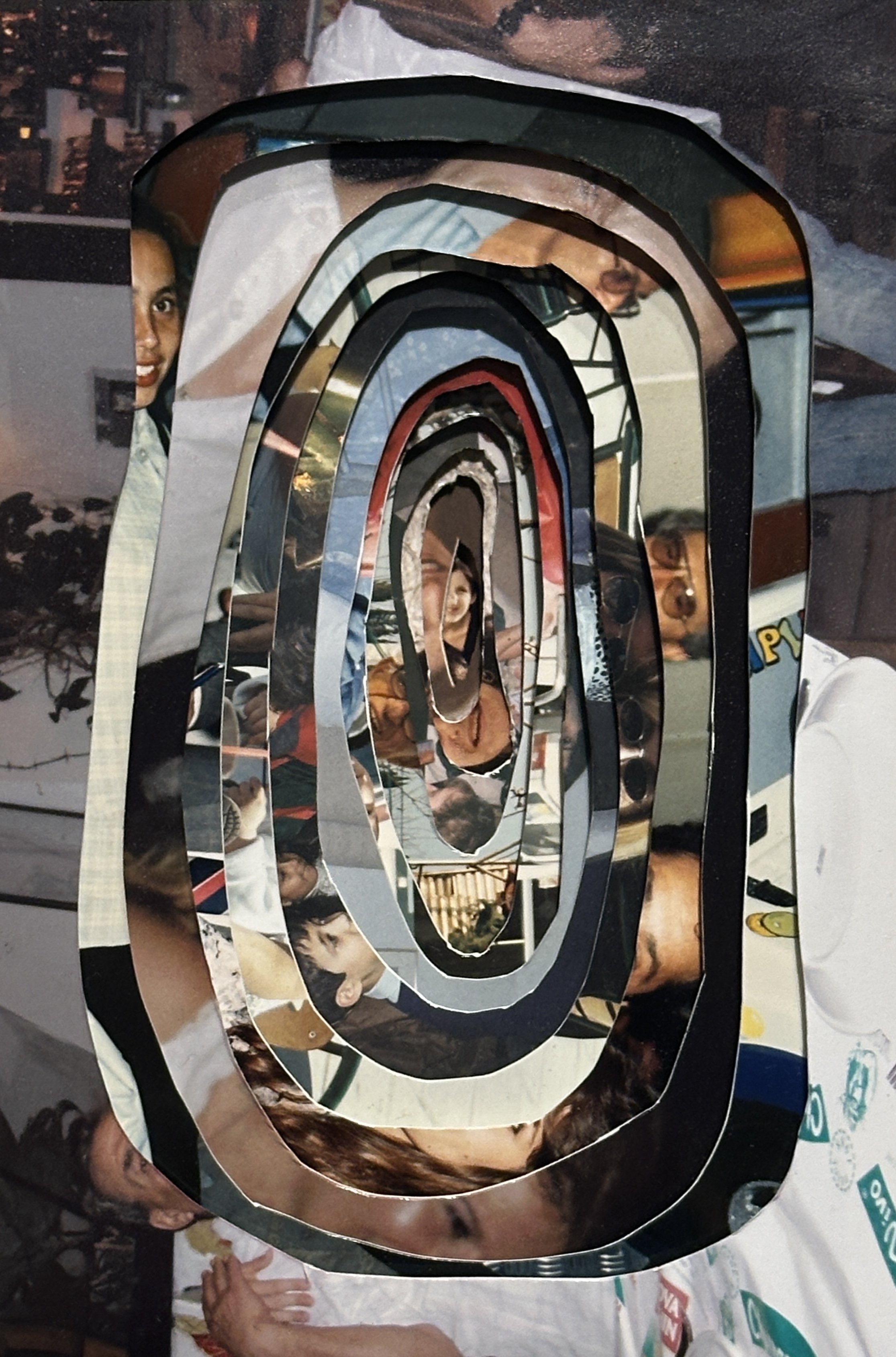 Installation view of Memory Excavation showing archival family photographs layered inside a wooden box, connecting personal memory with data mining.