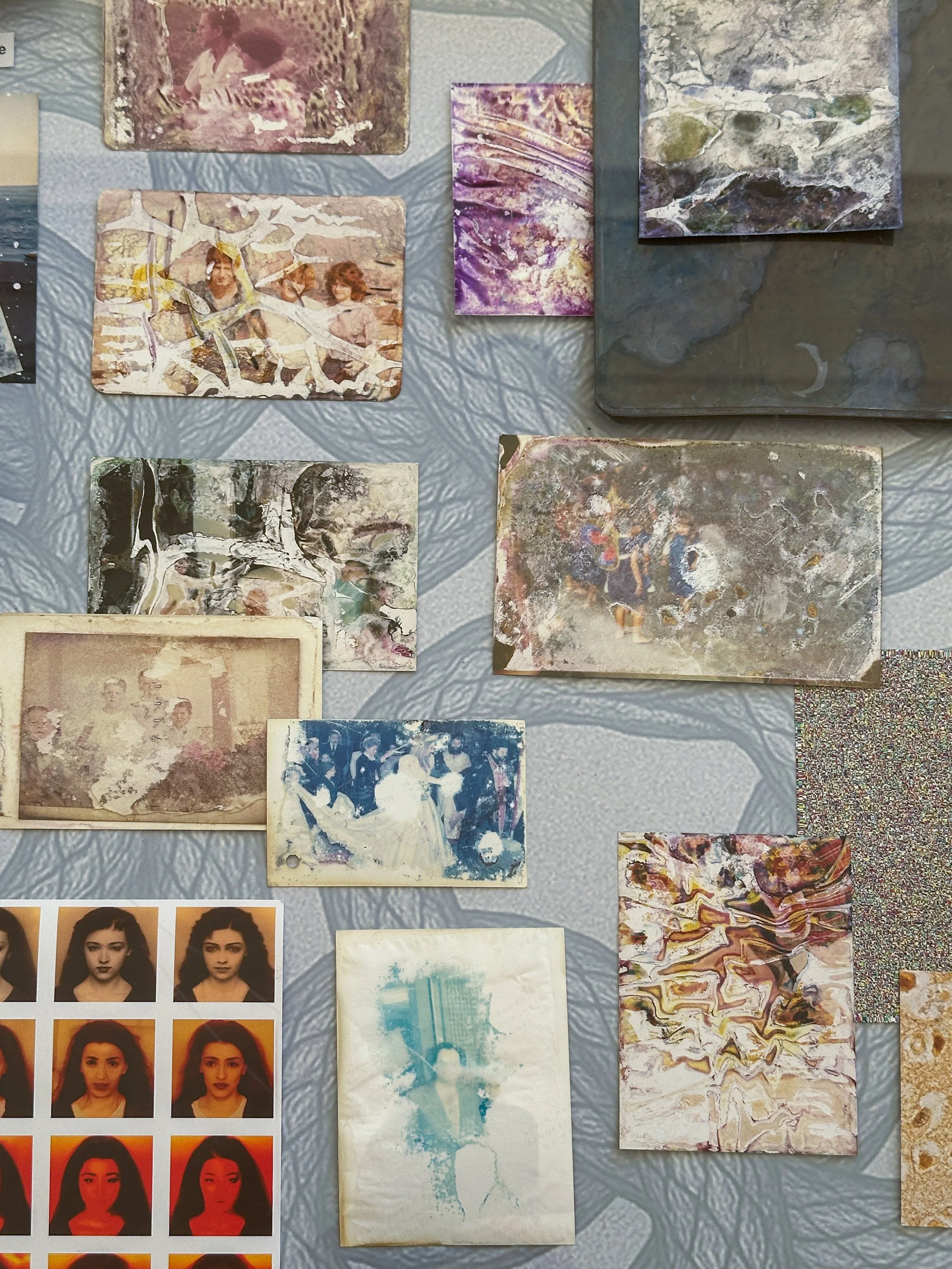Detail of Archive of Extraction, an open research workspace where archival photographs, minerals and technological references coexist.